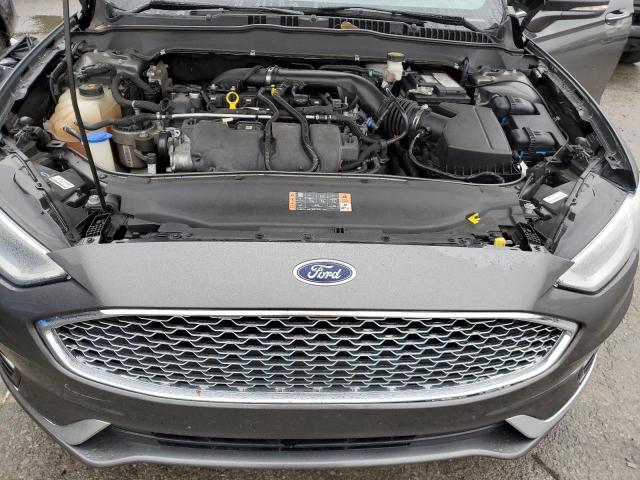 Photo 11 from auction – 2019 FORD FUSION TIT with VIN 3FA6P0D98KR138571