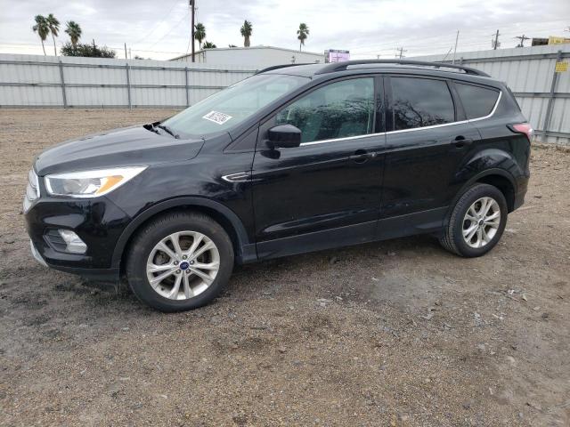 FORD ESCAPE SE 2018 with VIN 1FMCU0GD4JUC03229 - Photo from auction