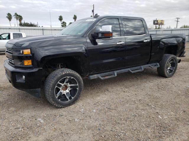CHEVROLET SILVERADO 2015 with VIN 1GC1KWE84FF637477 - Photo from auction