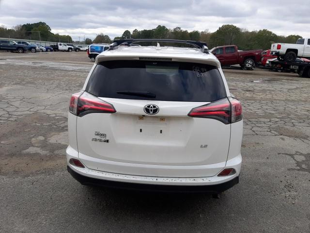 Photo 6 from auction – 2018 TOYOTA RAV4 LE with VIN JTMZFREV7JJ724908