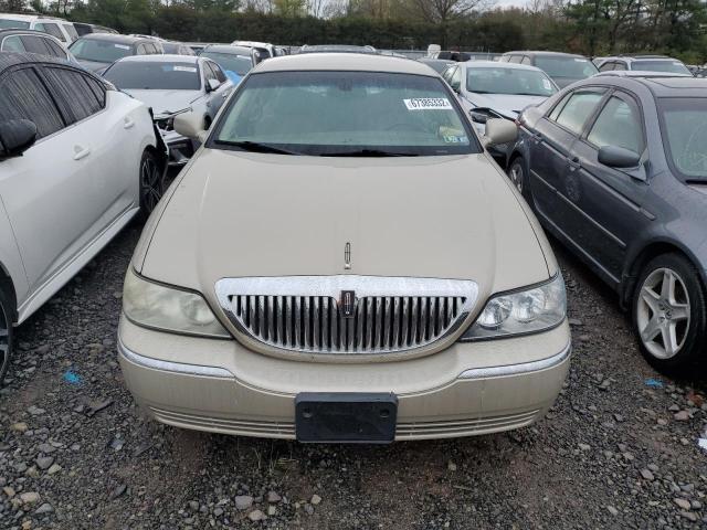 Photo 5 from auction – 2004 LINCOLN TOWN CAR E with VIN 1LNHM81W84Y677423