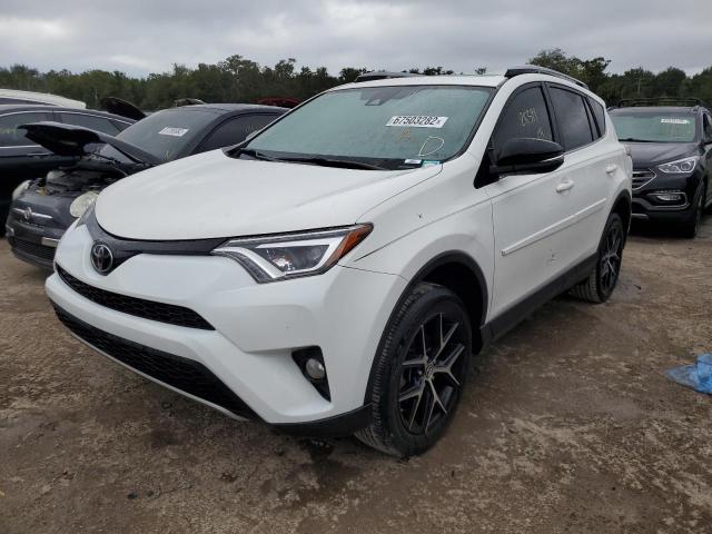 Photo 2 from auction – 2018 TOYOTA RAV4 SE with VIN JTMNFREV0JD126186