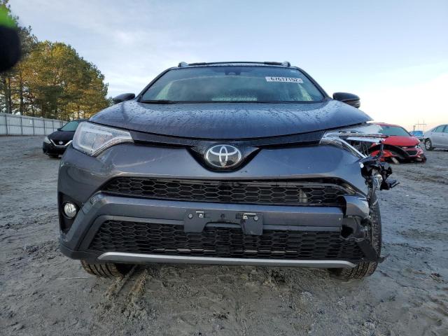 Photo 5 from auction – 2018 TOYOTA RAV4 SE with VIN JTMJFREV5JJ236733