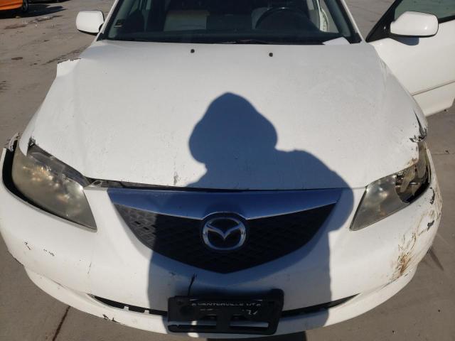 Photo 11 from auction – 2003 MAZDA 6 S with VIN 1YVFP80D335M41419