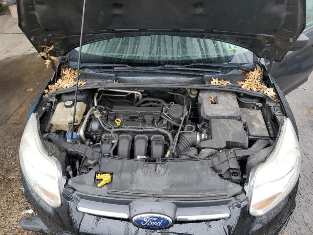 Photo 11 from auction – 2012 FORD FOCUS S with VIN 1FAHP3E20CL264824