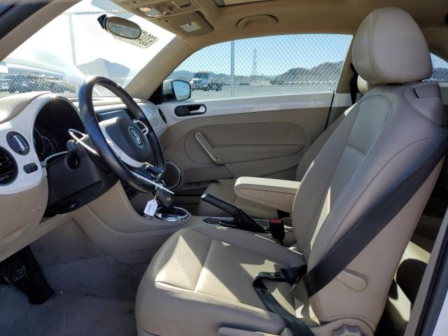 Photo 7 from auction – 2014 VOLKSWAGEN BEETLE with VIN 3VWJX7AT4EM628629