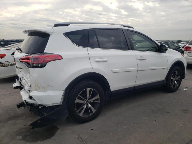 Photo 3 from auction – 2017 TOYOTA RAV4 XLE with VIN JTMWFREV3HD094803