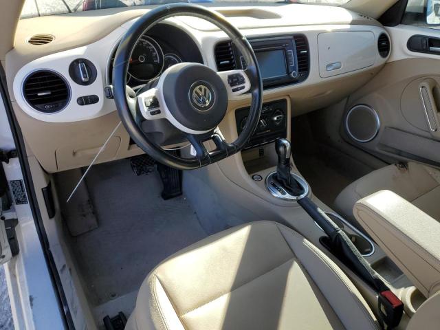 Photo 8 from auction – 2014 VOLKSWAGEN BEETLE with VIN 3VWJX7AT4EM628629