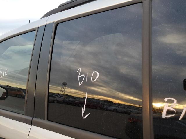 Photo 8 from auction – 2005 GMC ENVOY with VIN 1GKDS13S352185773