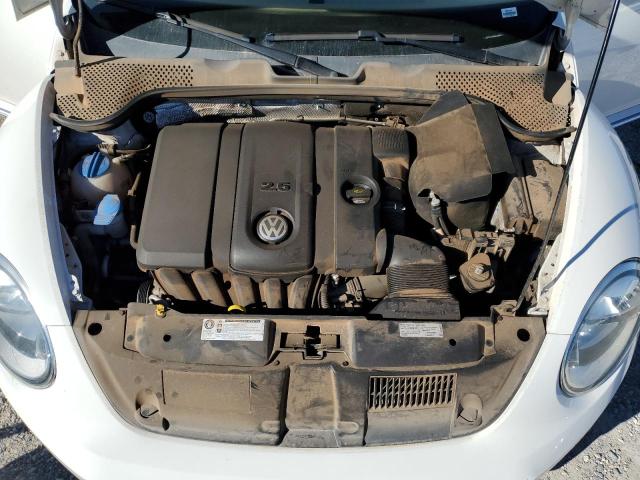 Photo 11 from auction – 2014 VOLKSWAGEN BEETLE with VIN 3VWJX7AT4EM628629
