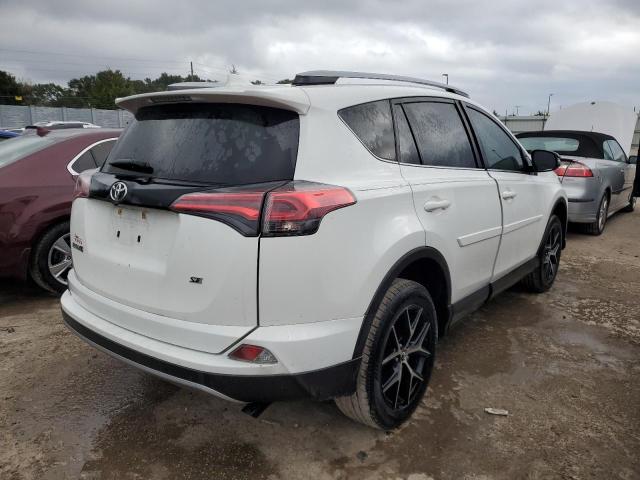 Photo 4 from auction – 2018 TOYOTA RAV4 SE with VIN JTMNFREV0JD126186