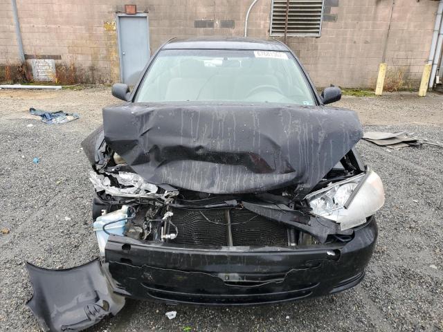 Photo 5 from auction – 2003 TOYOTA CAMRY LE with VIN 4T1BE32K43U176813