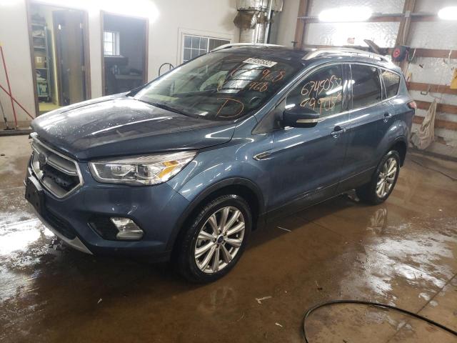 FORD ESCAPE TIT 2018 with VIN 1FMCU9J94JUC55968 - Photo from auction