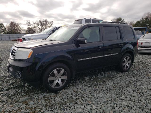 HONDA PILOT TOUR 2014 with VIN 5FNYF4H9XEB002861 - Photo from auction