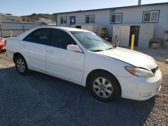 Photo 4 from auction – 2004 TOYOTA CAMRY LE with VIN JTDBF30K840155170