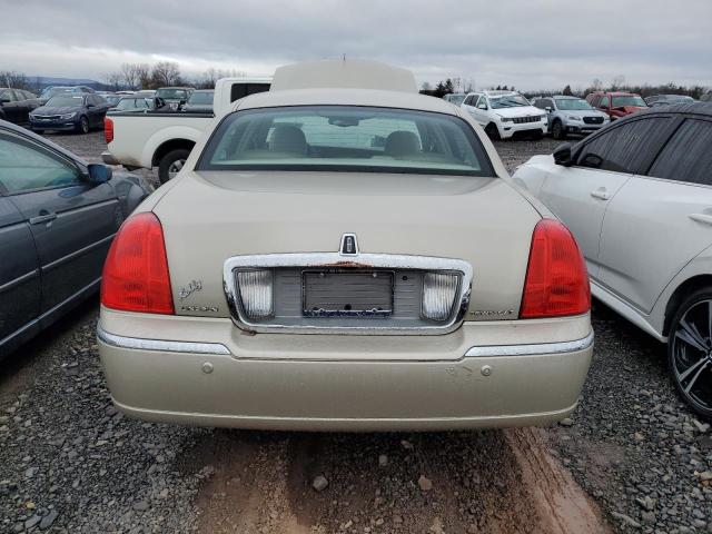 Photo 6 from auction – 2004 LINCOLN TOWN CAR E with VIN 1LNHM81W84Y677423