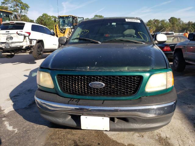 Photo 5 from auction – 2002 FORD F150 SUPER with VIN 1FTRW076X2KC55634