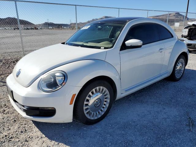 VOLKSWAGEN BEETLE 2014 with VIN 3VWJX7AT4EM628629 - Photo from auction