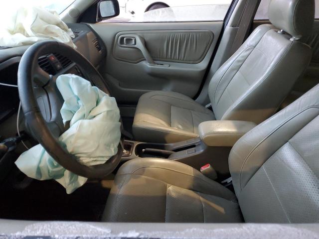 Photo 7 from auction – 2002 INFINITI G20 with VIN JNKCP11A22T509190