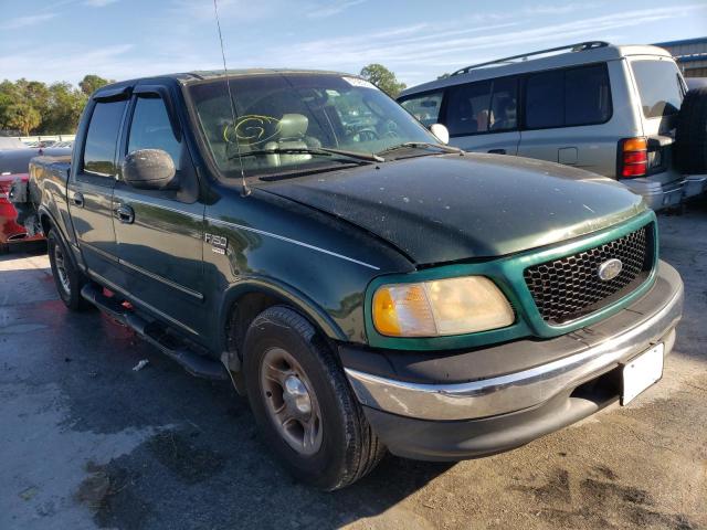 Photo 4 from auction – 2002 FORD F150 SUPER with VIN 1FTRW076X2KC55634