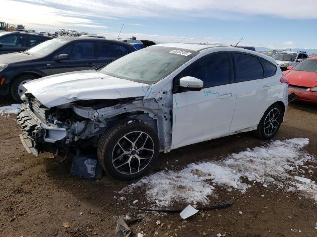 FORD FOCUS SE 2015 with VIN 1FADP3K2XFL358040 - Photo from auction