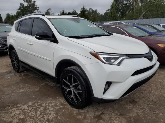TOYOTA RAV4 SE 2018 with VIN JTMNFREV0JD126186 - Photo from auction