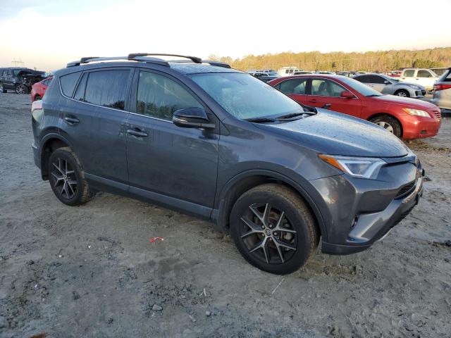 Photo 4 from auction – 2018 TOYOTA RAV4 SE with VIN JTMJFREV5JJ236733
