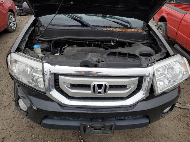 Photo 12 from auction – 2011 HONDA PILOT TOUR with VIN 5FNYF3H99BB001576