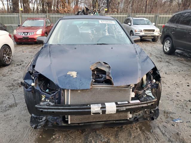 Photo 5 from auction – 2004 HONDA CIVIC LX with VIN 2HGES16544H620636