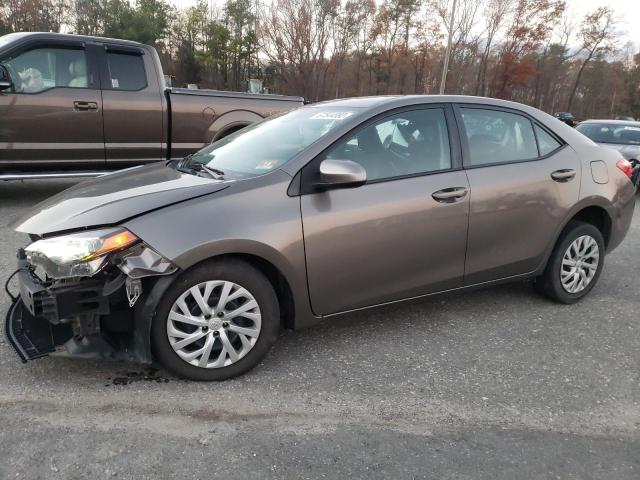 TOYOTA COROLLA L 2017 with VIN 2T1BURHE3HC869016 - Photo from auction