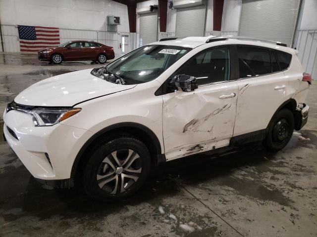 TOYOTA RAV4 LE 2018 with VIN 2T3ZFREV7JW512236 - Photo from auction