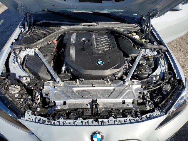 Photo 11 from auction – 2022 BMW M440I with VIN WBA83AP03NCH60693
