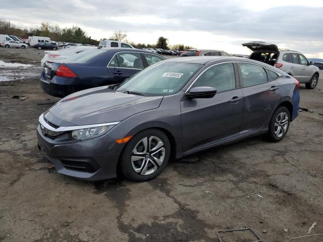 HONDA CIVIC LX 2017 with VIN 2HGFC2F57HH531012 - Photo from auction