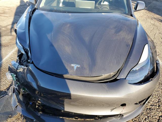 Photo 11 from auction – 2022 TESLA MODEL 3 with VIN 5YJ3E1EB5NF274737