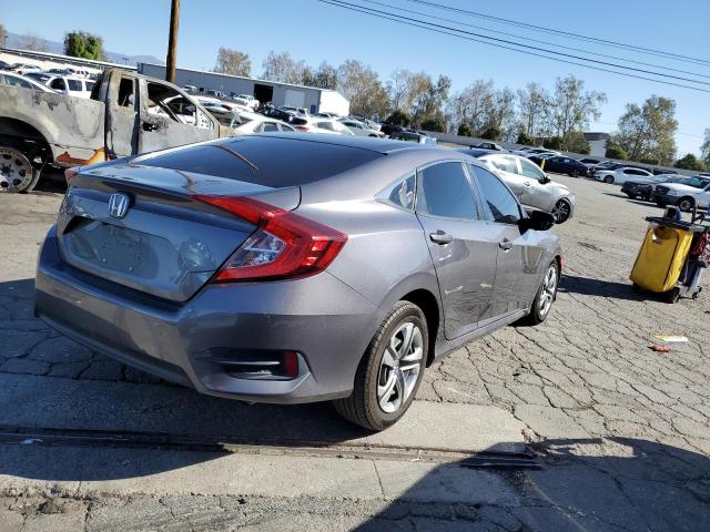 Photo 3 from auction – 2018 HONDA CIVIC LX with VIN 2HGFC2F59JH517229