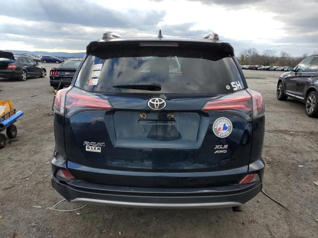 Photo 6 from auction – 2017 TOYOTA RAV4 XLE with VIN JTMRFREV9HJ128807