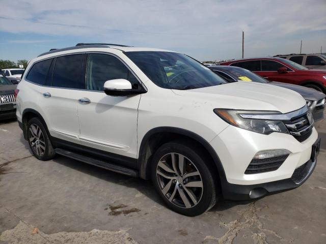 Photo 4 from auction – 2016 HONDA PILOT ELIT with VIN 5FNYF6H02GB103313