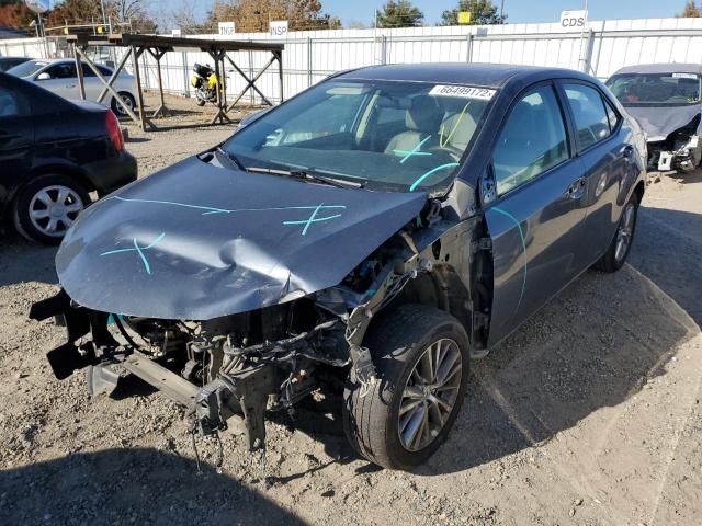 TOYOTA COROLLA L 2014 with VIN 5YFBURHE7EP050294 - Photo from auction