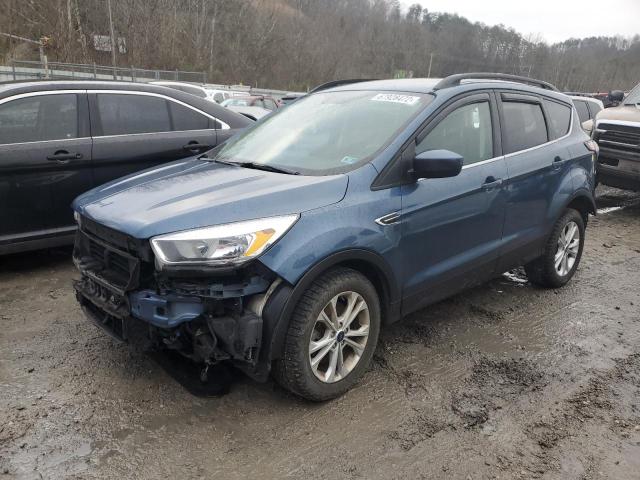 FORD ESCAPE SE 2018 with VIN 1FMCU9GD8JUC37419 - Photo from auction