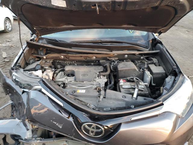 Photo 12 from auction – 2018 TOYOTA RAV4 LE with VIN 2T3BFREVXJW856712