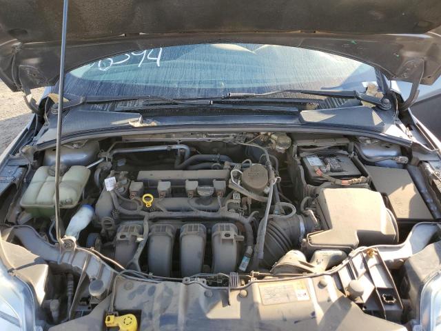 Foto 11 de la subasta – 2014 FORD FOCUS SE con VIN 1FADP3F24EL166394