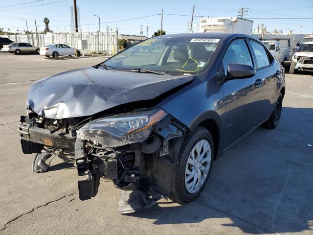 TOYOTA COROLLA L 2019 with VIN 5YFBURHE8KP932103 - Photo from auction