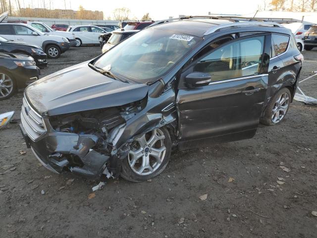 FORD ESCAPE TIT 2018 with VIN 1FMCU9J92JUA86601 - Photo from auction