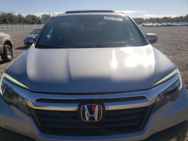 Photo 5 from auction – 2018 HONDA RIDGELINE with VIN 5FPYK3F79JB004349