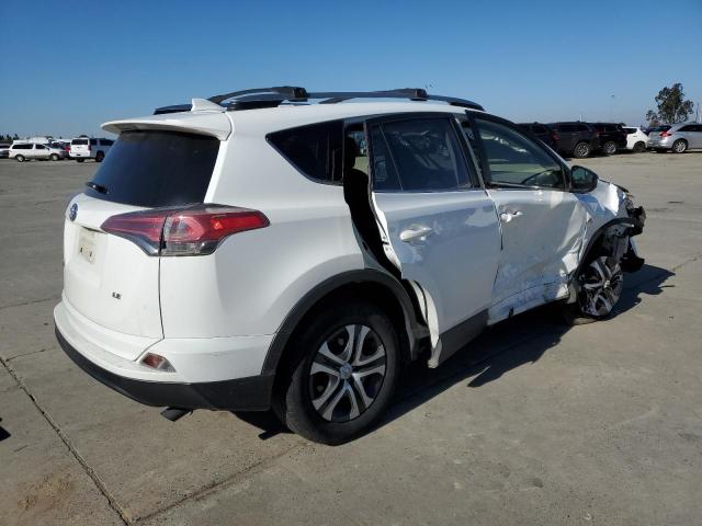 Photo 3 from auction – 2017 TOYOTA RAV4 LE with VIN JTMZFREV9HJ101123