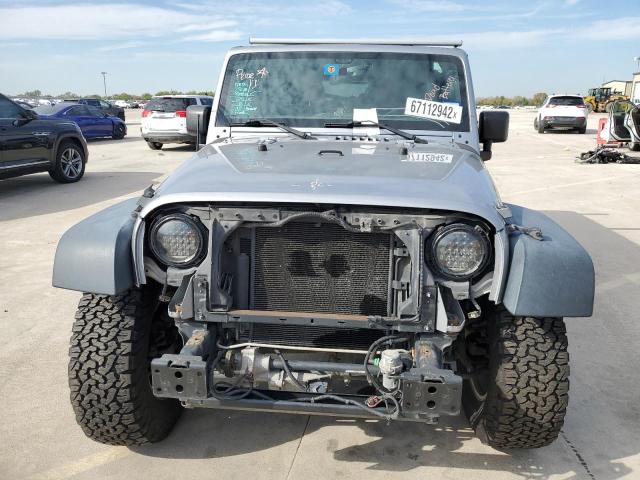 Photo 5 from auction – 2014 JEEP WRANGLER U with VIN 1C4BJWFG1EL127097