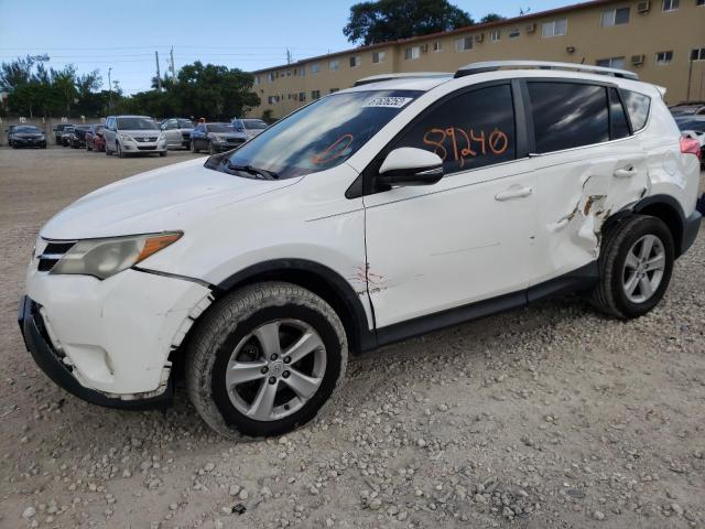 TOYOTA RAV4 XLE 2014 with VIN 2T3WFREV9EW085828 - Photo from auction