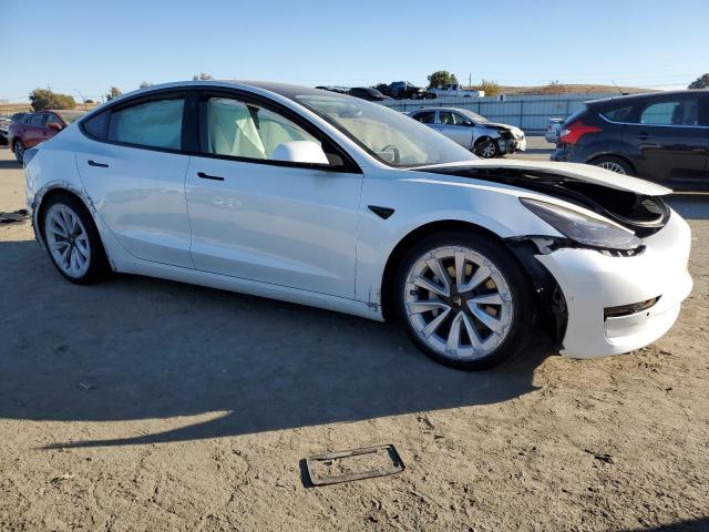 Photo 4 from auction – 2022 TESLA MODEL 3 with VIN 5YJ3E1EA0NF103210