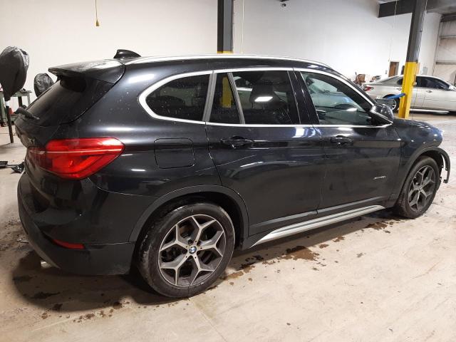 Photo 3 from auction – 2016 BMW X1 XDRIVE2 with VIN WBXHT3C30G5F65403