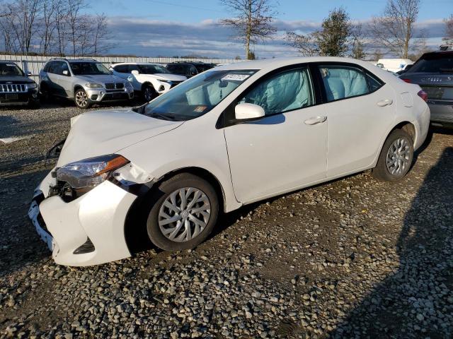 TOYOTA COROLLA L 2017 with VIN 5YFBURHE1HP591538 - Photo from auction